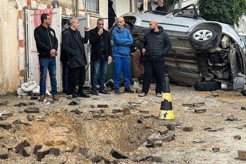 In Pictures: Iranian missile hits Arab city in central Israel